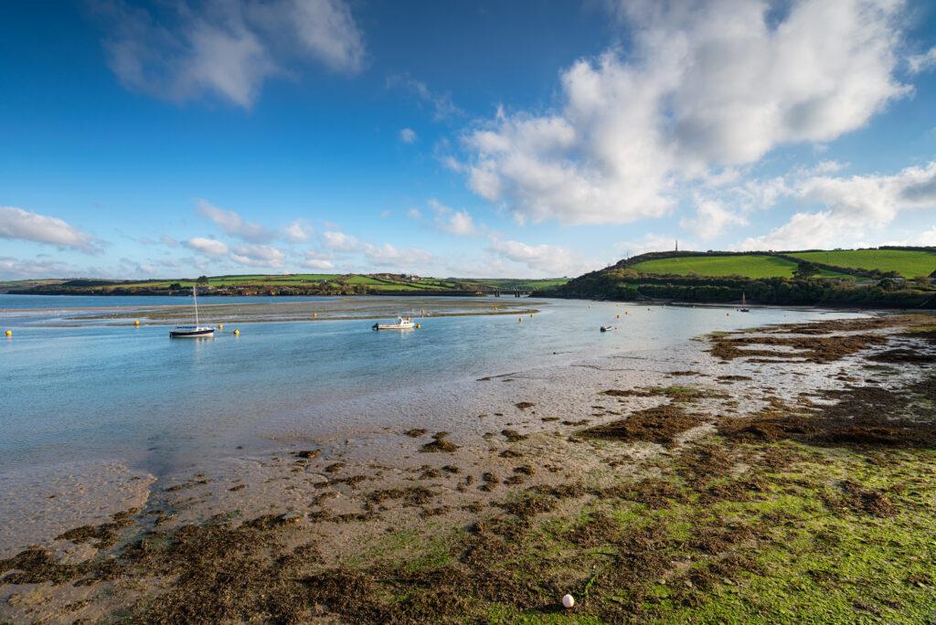 Boats on the Camel estuary near Padstow in Cornwall, looking out to the Iron Bridge and Little Petherick Creek