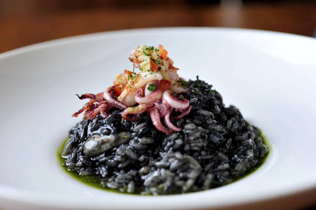 Black risotto with seafood - My Travel Monkey