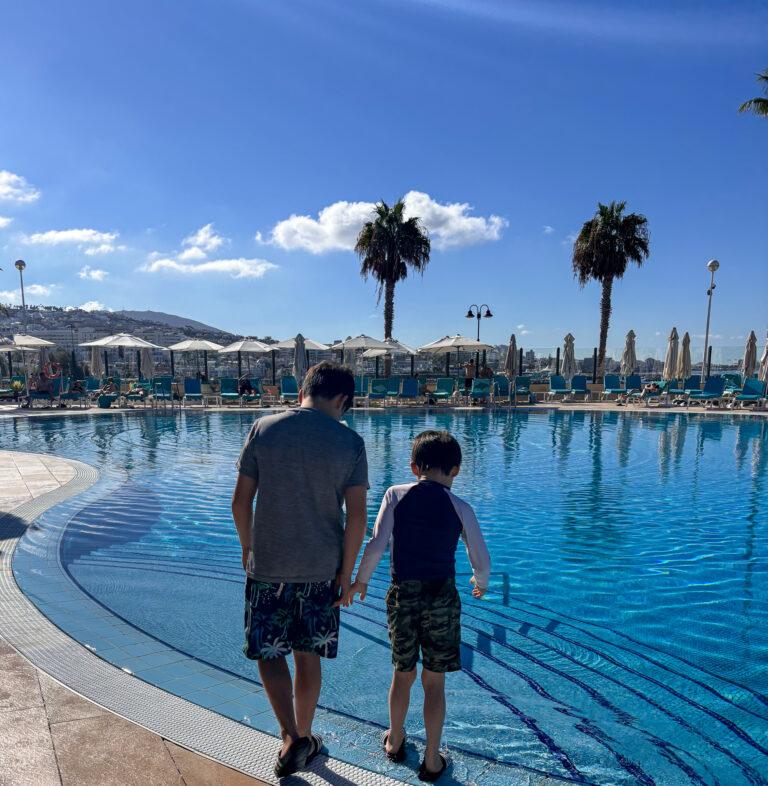 Kids by swimming pool in Tenerife - My Travel Monkey