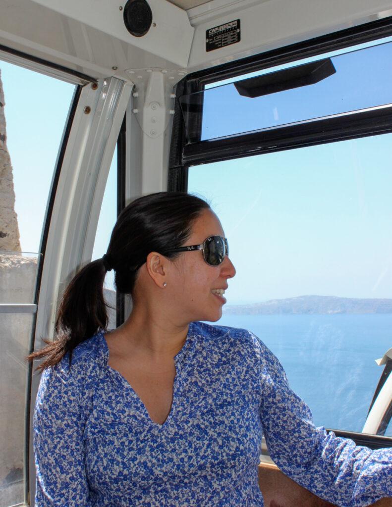 On the Fira cable car, Santorini - My Travel Monkey