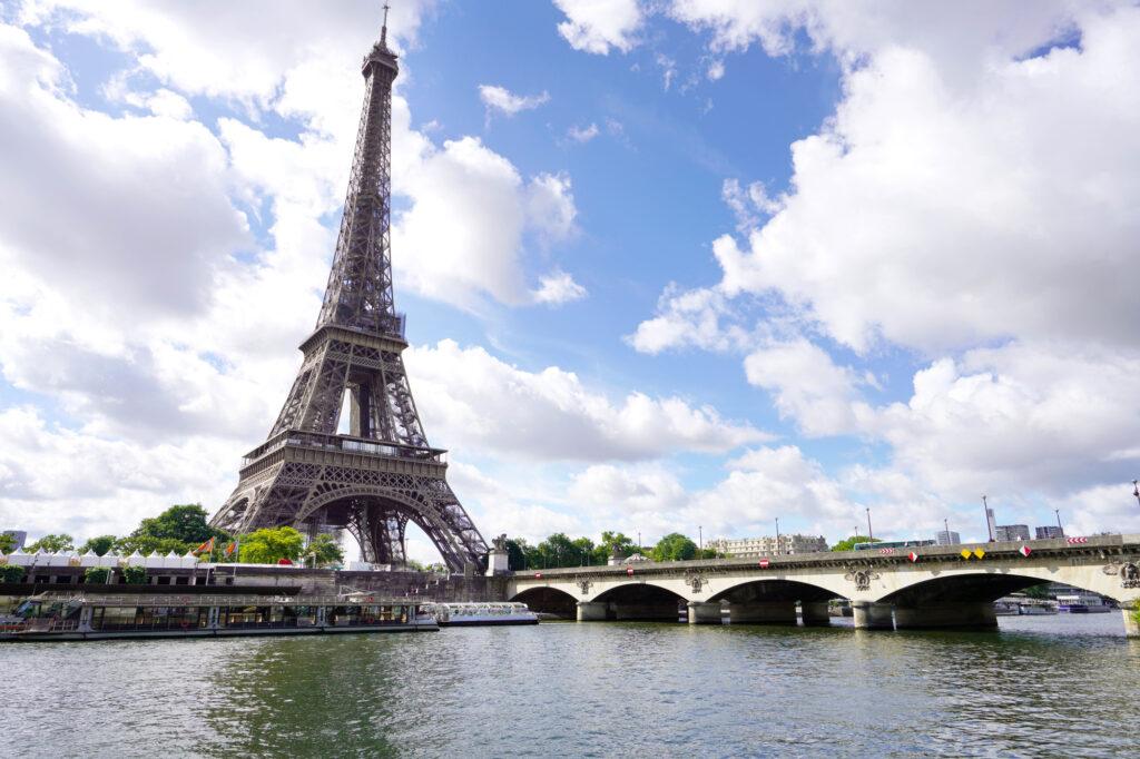 The Eiffel Tower and Pont d'Iena bridge on the Seine in Paris, France - My Travel Monkey