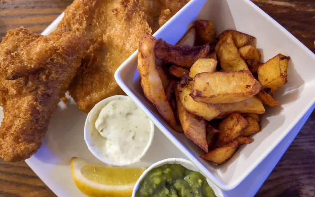 Fish and chips and mushy peas at The Blue Peter Inn, Polperro