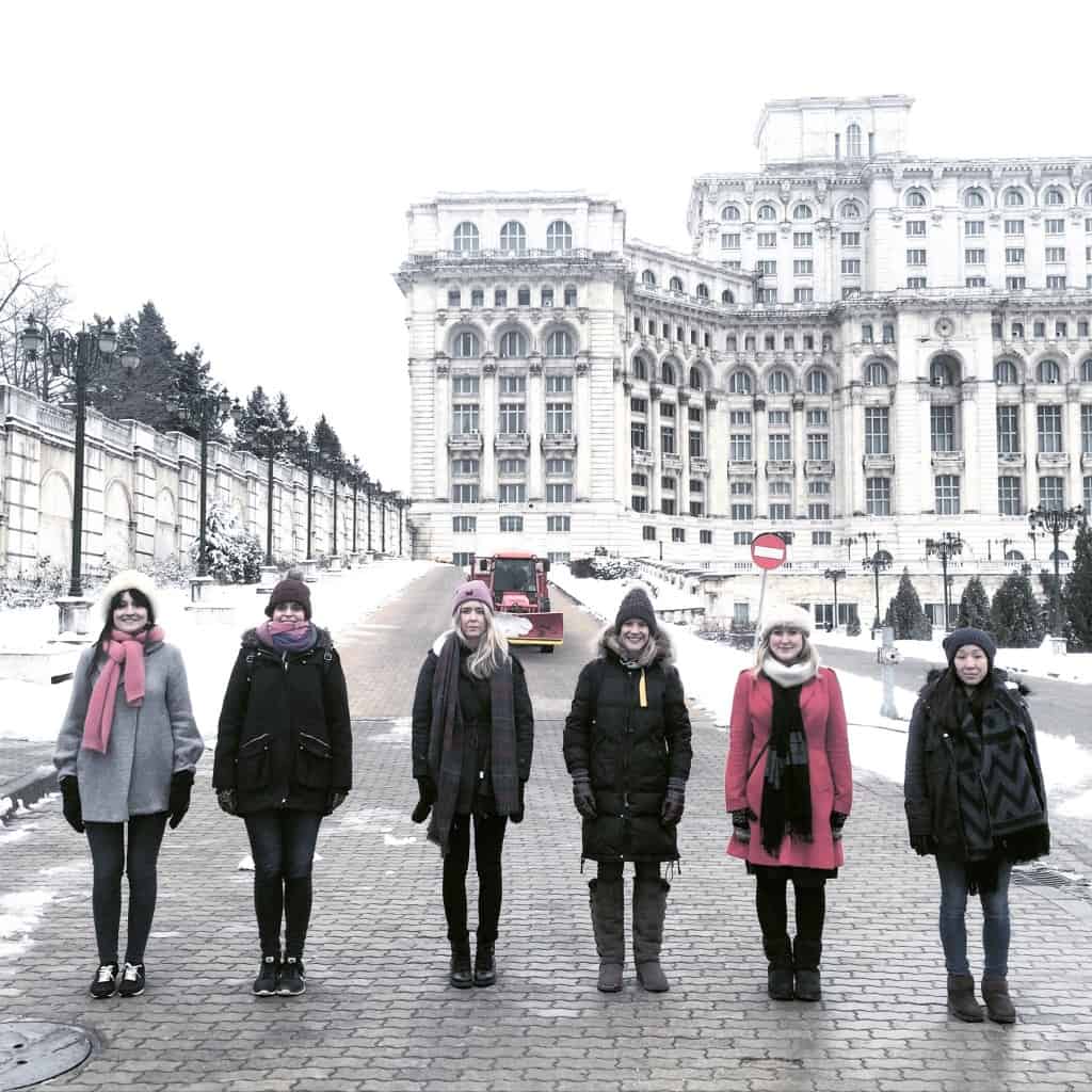 Friends posing outside Palace of Parliament Bucharest-My Travel Monkey
